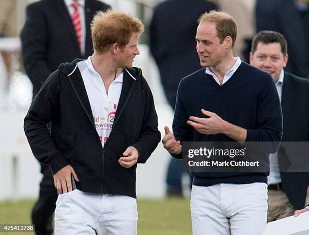 Prince William, Duke of Cambridge and Prince Harry attend day two of the Audi Polo Challenge at Coworth Park on May 31, 2015 in London, England.