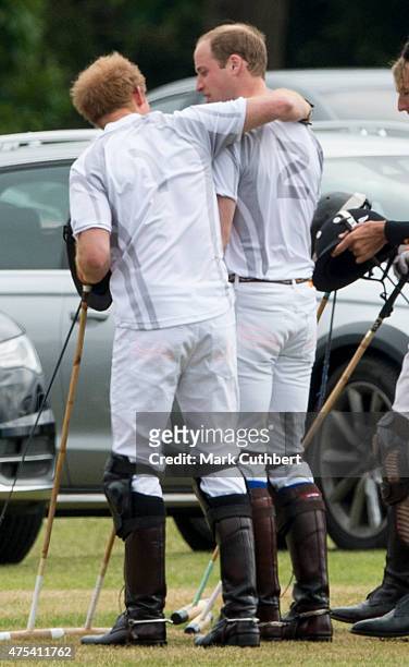 Prince William, Duke of Cambridge and Prince Harry attend day two of the Audi Polo Challenge at Coworth Park on May 31, 2015 in London, England.