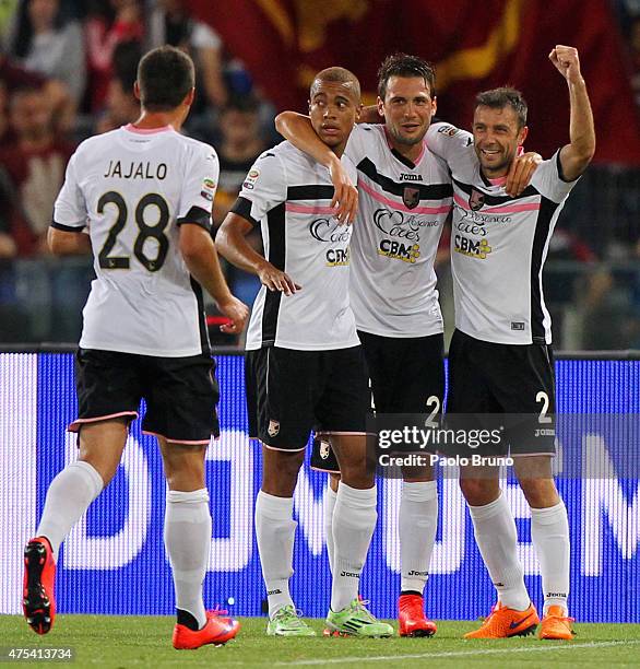 Franco Vazquez with his teammates of US Citta' di Palermo celebrates after scoring the opening goal from penalty spot during the Serie A match...