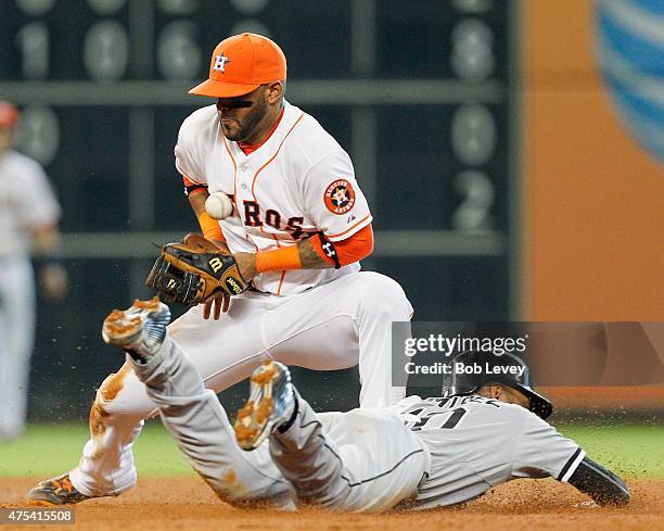 Alexei Ramirez of the Chicago White Sox steals second base as Jonathan Villar of the Houston Astros can't handle the throw in the sixth inning at...