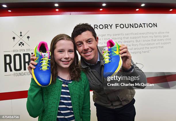 Alex Kernaghan aged 12 who is supported by Cancer Fund For Children and who designed Rory McIlroy's Nike golf shoes for the final round of the Dubai...