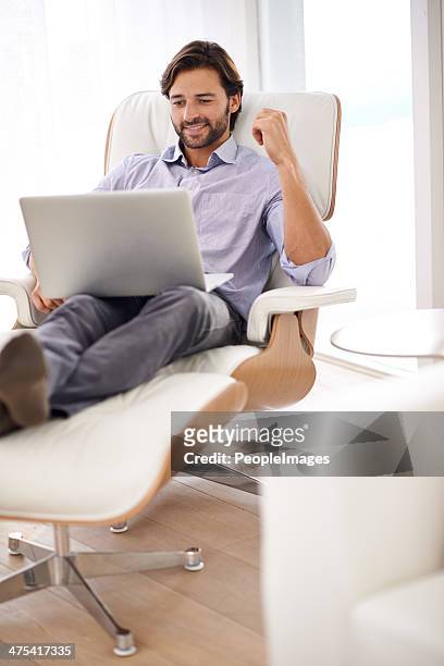 mixing business with leisure - recliner chair stock pictures, royalty-free photos & images