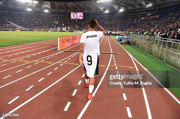 Paulo Dybala of Palermo leaves the pitch after the Serie A match between AS Roma and US Citta di Palermo at Stadio Olimpico on May 31, 2015 in Rome,...