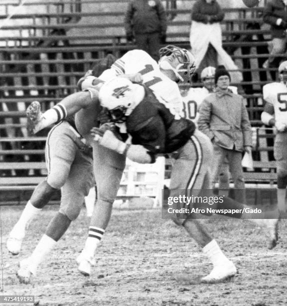 Photograph of a football tackler during a North Dakota Bison football game, 1980.