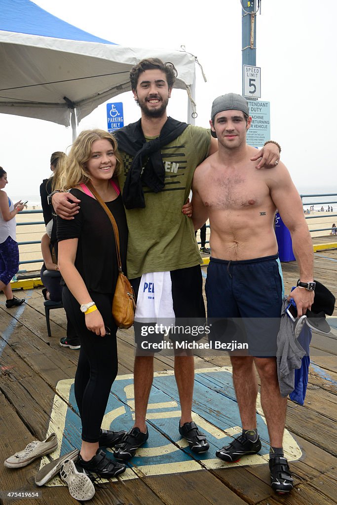 Madi McQueen, Chase McQueen, and Steven R. McQueen attend Harold