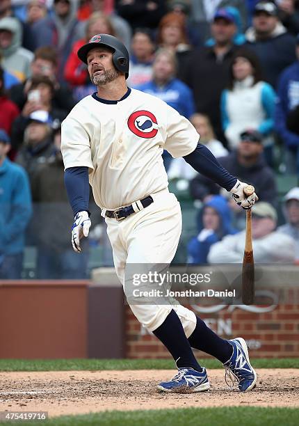 David Ross of the Chicago Cubs gets the game winning hits a, a single in the iith inning against the Kansas City Royals at Wrigley Field on May 31,...