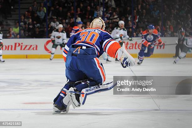 Ben Scrivens of the Edmonton Oilers skates to the bench in a game against the Minnesota Wild on February 27, 2014 at Rexall Place in Edmonton,...