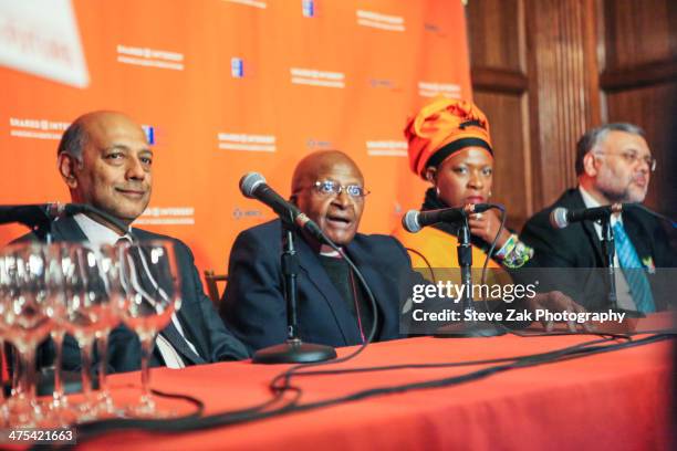 Anant Singh, Archbishop Desmond Tutu, Reverend Mpho Andrea Tutu and Ebrahim Rasool speak ata panel at 2014 Shared Interest Awards gala on February...