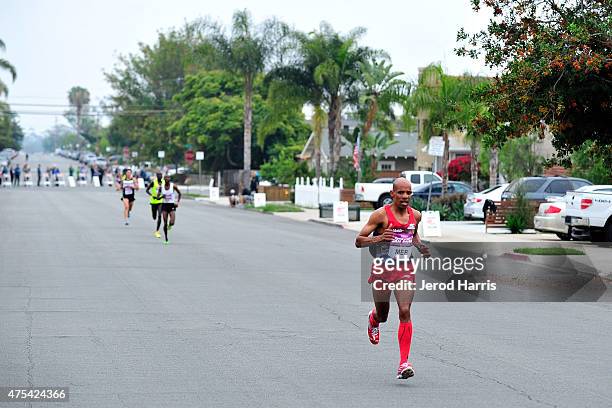 Olympic athlete Meb Keflezighi participates in the Suja Rock 'n' Roll San Diego Marathon & 1/2 Marathon on May 31, 2015 in San Diego, California.
