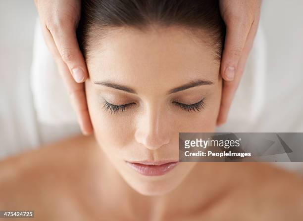 pure bliss - massaging stock-fotos und bilder
