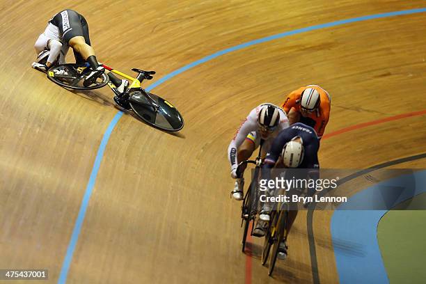 Maximilian Levy of Germany crashes out of the Men's Keirin on day two of the 2014 UCI Track Cycling World Championships at the Velodromo Alcides...