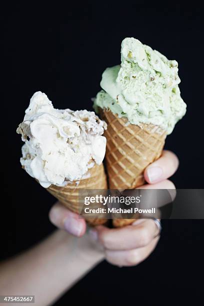 rum and raisin cornet with pistachio cornet - rum raisin ice cream stock pictures, royalty-free photos & images