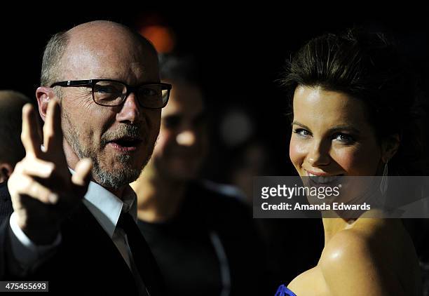 Screenwriter Paul Haggis and actress Kate Beckinsale arrive at the Hollywood Domino's 7th Annual Pre-Oscar Charity Gala at Sunset Tower on February...