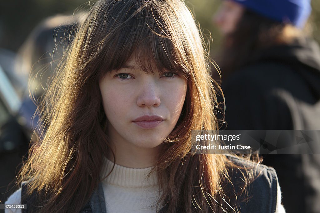 Young brunette girl looking confident in the sun