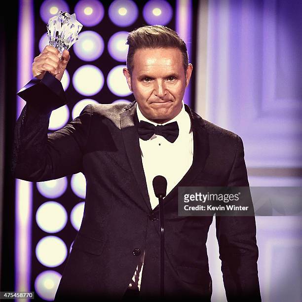 Producer Mark Burnett accepts the Best Reality Series award for "Shark Tank" onstage during the 5th Annual Critics' Choice Television Awards at The...