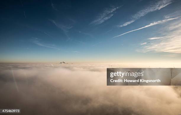 canary wharf above the cloudbase - cloudscape horizon stock pictures, royalty-free photos & images