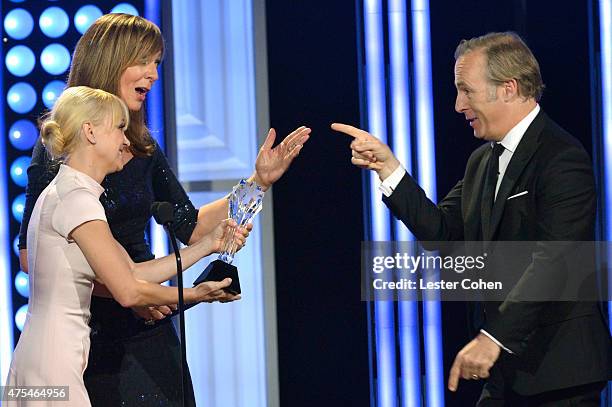 Actresses Anna Faris and Allison Janney present the Best Actor in a Drama Series award to actor Bob Odenkirk for "Better Call Saul" onstage at the...