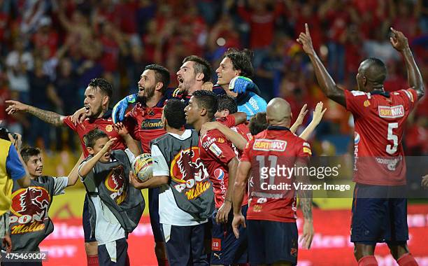 Players of Independiente Medellin celebrate after winning a semifinal match between Medellin and Deportes Tolima as part of the Liga Águila I 2015 at...