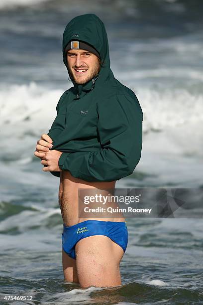 Josh Bruce of the Saints stands in the water during a St Kilda Saints recovery session at Brighton Beach on June 1, 2015 in Melbourne, Australia.