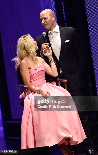 Elisabeth Hasselbeck and Tim Hasselbeck speak onstage during the 3rd Annual KLOVE Fan Awards at the Grand Ole Opry House on May 31, 2015 in...