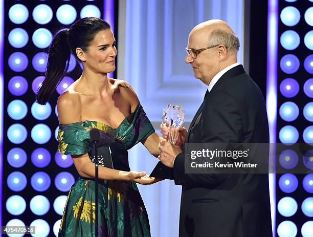 Actor Jeffrey Tambor accepts the Best Actor in a Comedy Series award for "Transparent" from actress Angie Harmon onstage at the 5th Annual Critics'...