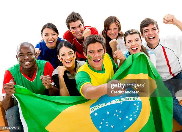 footballs fans watching tv - germany vs brazil 2014 stock pictures, royalty-free photos & images