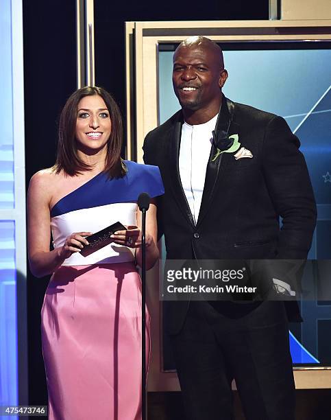 Actors Chelsea Peretti and Terry Crews speak onstage at the 5th Annual Critics' Choice Television Awards at The Beverly Hilton Hotel on May 31, 2015...