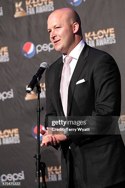 Tim Hasselbeck speaks onstage in the press room during the 3rd Annual KLOVE Fan Awards at the Grand Ole Opry House on May 31, 2015 in Nashville,...