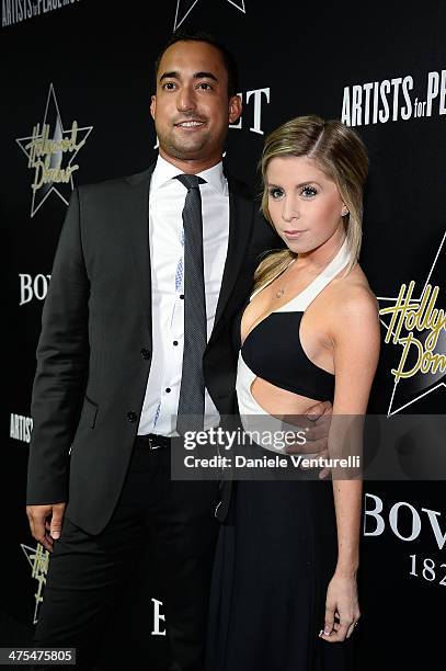 Matthew Lamothe and Lindsay Lamb attend the 7th Annual Hollywood Domino and Bovet 1822 Gala benefiting artists for peace and justice at Sunset Tower...