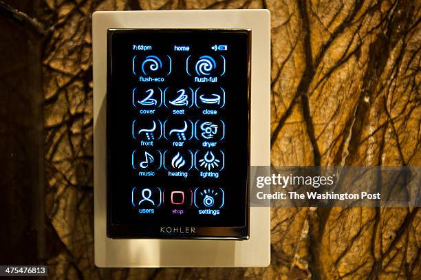 The toilet has a remote control mounted on the wall with functions such as seating heating, music, and bidet settings Wednesday February 19, 2014 in...