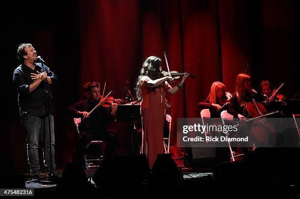 Mark Hall and Melodee Devevo of muscial group Casting Crowns perform onstage during the 3rd Annual KLOVE Fan Awards at the Grand Ole Opry House on...