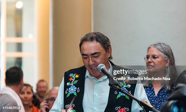 Toronto PanAm 2015 Fire Welcome Ceremony: Gary Lipinski president of the Métis Nation of Ontario speaks and remarks that rain is a positive sign in...