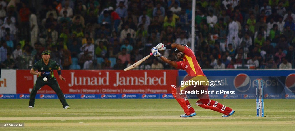 Pakistani and Zimbabwean cricketers take part in the third...