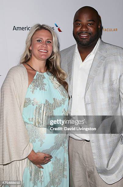 Former NFL player Albert Haynesworth and Brittany Jackson attend the Cedars-Sinai Sports Spectacular at the Hyatt Regency Century Plaza on May 31,...