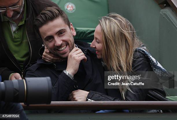 Audrey Lamy and her boyfriend Thomas Sabatier attend day 8 of the French Open 2015 at Roland Garros stadium on May 31, 2015 in Paris, France.