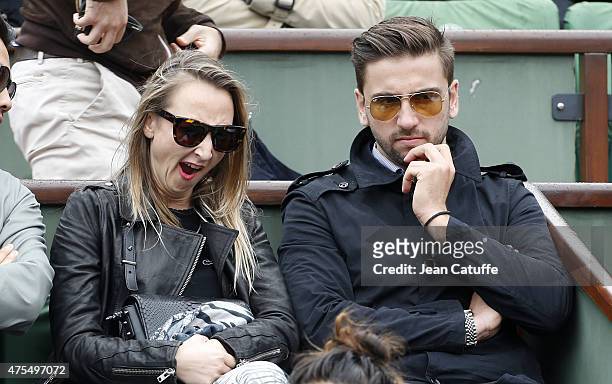 Audrey Lamy and her boyfriend Thomas Sabatier attend day 8 of the French Open 2015 at Roland Garros stadium on May 31, 2015 in Paris, France.