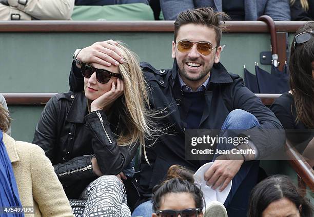 Audrey Lamy and her boyfriend Thomas Sabatier attend day 8 of the French Open 2015 at Roland Garros stadium on May 31, 2015 in Paris, France.