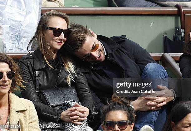 Audrey Lamy and her boyfriend Thomas Sabatier attend day 8 of the French Open 2015 at Roland Garros stadium on May 31, 2015 in Paris, France.