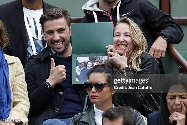 Audrey Lamy and her boyfriend Thomas Sabatier attend day 8 of the French Open 2015 at Roland Garros stadium on May 31, 2015 in Paris, France.