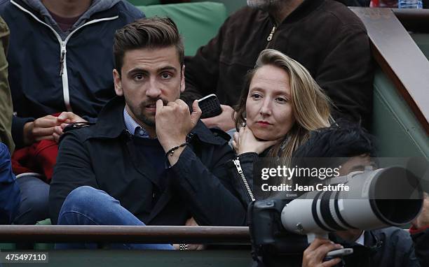 Audrey Lamy and her boyfriend Thomas Sabatier attend day 8 of the French Open 2015 at Roland Garros stadium on May 31, 2015 in Paris, France.