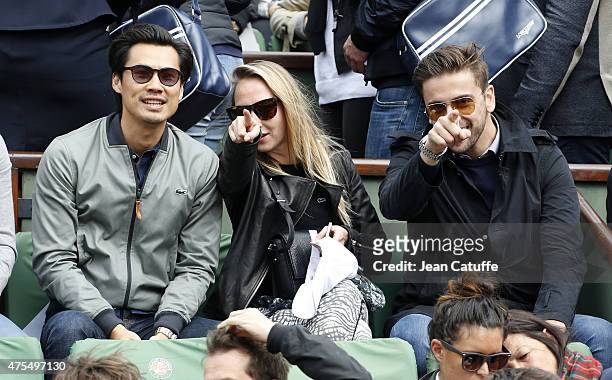 Frederic Chau, Audrey Lamy and her boyfriend Thomas Sabatier attend day 8 of the French Open 2015 at Roland Garros stadium on May 31, 2015 in Paris,...