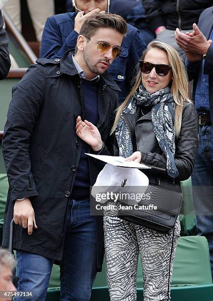 Audrey Lamy and her boyfriend Thomas Sabatier attend day 8 of the French Open 2015 at Roland Garros stadium on May 31, 2015 in Paris, France.