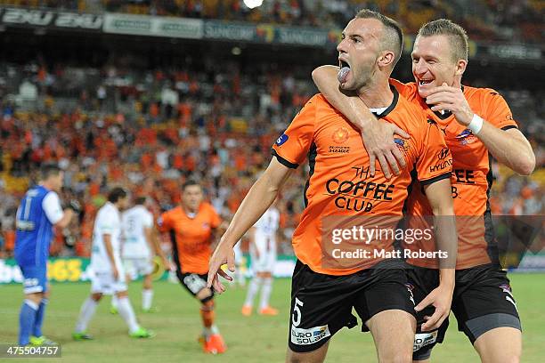 Ivan Franjic of the Roar celebrates a goal with Besart Berisha during the round 21 A-League match between Brisbane Roar and Perth Glory at Suncorp...