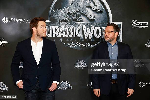Chris Pratt and Colin Trevorrow attend the 'Jurassic World' Photocall on June 01, 2015 in Berlin, Germany.