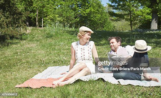 Actor Clovis Cornillac and his wife Lilou Fogli are photographed for Paris Match on April 23, 2015 in Paris, France.