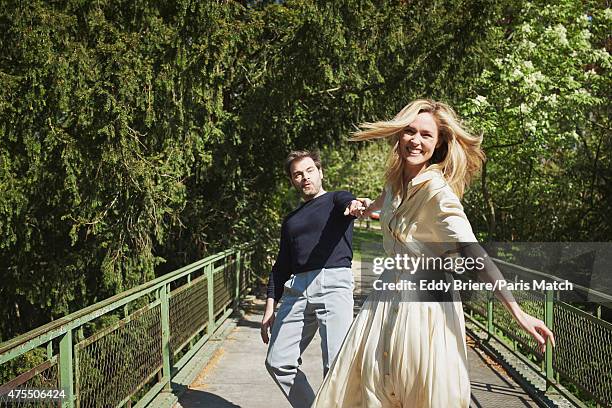 Actor Clovis Cornillac and his wife Lilou Fogli are photographed for Paris Match on April 23, 2015 in Paris, France.