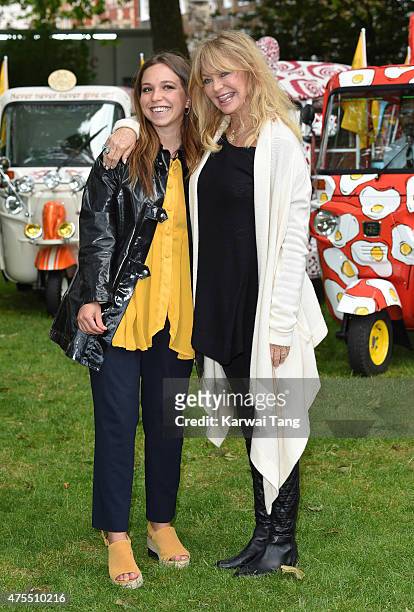 Ayesha Shand and Goldie Hawn attend a photocall to launch 'Travels To My Elephant' at Manchester Square on June 1, 2015 in London, England.