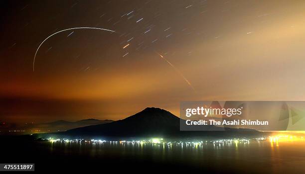 In this long exposure image, The H-2A Launch Vehicle No. 23 carrying the Global Precipitation Measurement core observatory onboard lifts off from the...