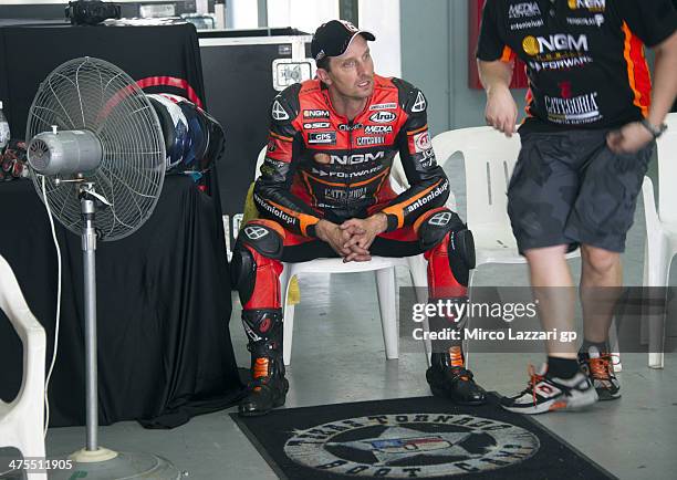 Colin Edwards of USA and NGM Mobile Forward Racing looks on in box during the MotoGP Tests in Sepang - Day Three at Sepang Circuit on February 28,...