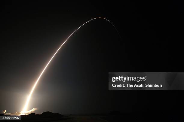 In this long exposure image, The H-2A Launch Vehicle No. 23 carrying the Global Precipitation Measurement core observatory onboard lifts off from the...